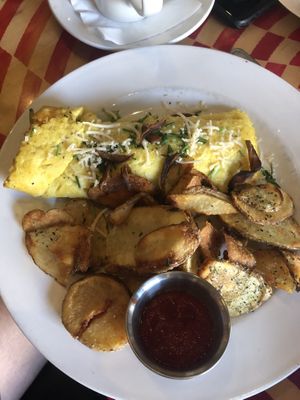 Vegan Omelette with potato’s  at City O' City in Denver