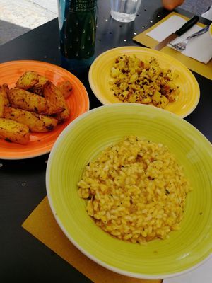 Rice main with baked chips and cauliflower side. at L'Orto Bistrot in Turin