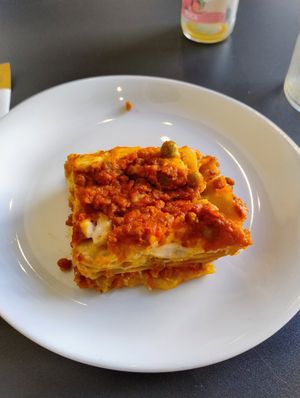 Small, sad lasagna (the plate is a breakfast plate) at L'Orto Bistrot in Turin