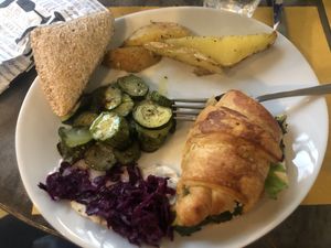 lunch - zucchini, potatoes and a croissant with tofu cream and veggies at L'Orto Bistrot in Turin