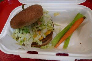 Cowspiracy Burger:
Quarter-Pound Grilled Pea Protein Patty
Daiya Udder-less Cheddar
Sautéed Mushrooms
Organic Power Greens, Sliced Beet' mater's
Onions, Utah Sauce on Sesame Bun at Lil' Lotus in Salt Lake City