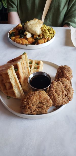 Chicken and waffles! (Unsure of the other dish's name but is tofu scramble, potatoes, and biscuits and gravy) at Urbavore in Lynchburg
