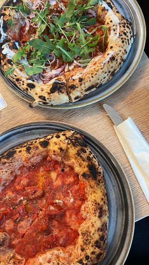 Pizza Marinara di Vegazzi and Pizza Ungherese at Vegazzi Specialty Pizzeria in Budapest