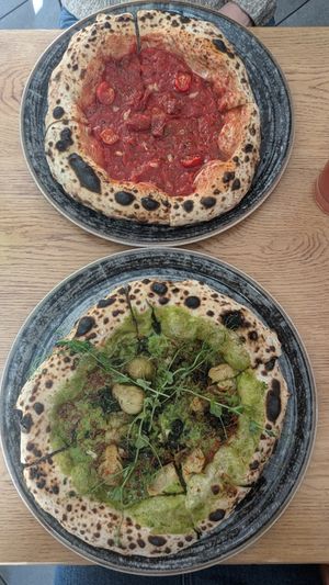 Pizza Verde and Pizza Marinara at Vegazzi Specialty Pizzeria in Budapest