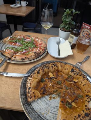 Sausage pizza and BBQ pizza at Vegazzi Specialty Pizzeria in Budapest
