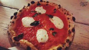 Delicious Margherita pizza at Vegazzi Specialty Pizzeria in Budapest