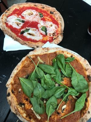 margarita and mushroom pesto pizzas at Vegazzi Specialty Pizzeria in Budapest