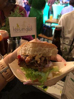 burger (cut into quarters) at Hans im Glück in Central Singapore