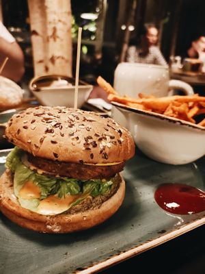 Feuer meister burger includes gold vegan cheese. at Hans im Glück in Central Singapore