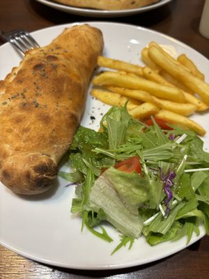 Calzone  vegan pepperoni cheese   at Slices in Osaka