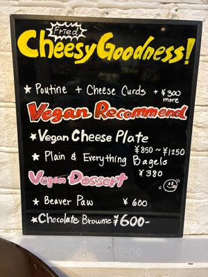 Vegan options on chalkboard at Slices in Osaka