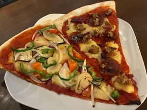 Garden Veggie and NoMeat Lovers slices at Slices in Osaka