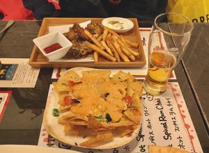 Fish & chips and nachos  at Slices in Osaka