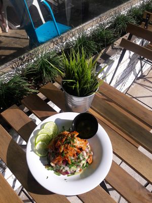 Israeli salad topped with MEATLESS BBQ CHICKEN . at The Hummus House in Fort Lauderdale