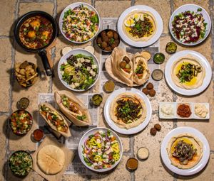 all of our good food in one picture!!! at The Hummus House in Fort Lauderdale