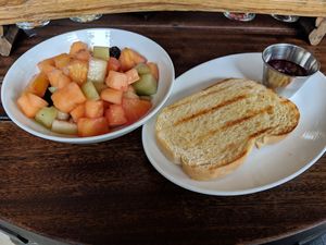 Sour fruit bowl and toast with jam at Wicked Weed - Funkatorium in Asheville