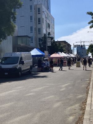 Street view of market  at Capitol Hill Sunday Farmers Market in Seattle