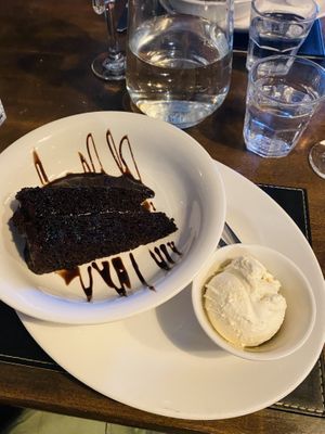 Chocolate fudge cake and ice cream    at The Courie Inn in Killin