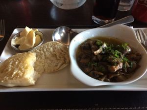 Garlic mushrooms with crusty bread and vegan spread at The Courie Inn in Killin
