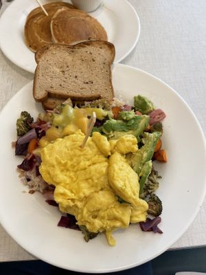 Hippie hash/ upgrade with vegan eggs and gluten-free toast  at Anna's House in Westland