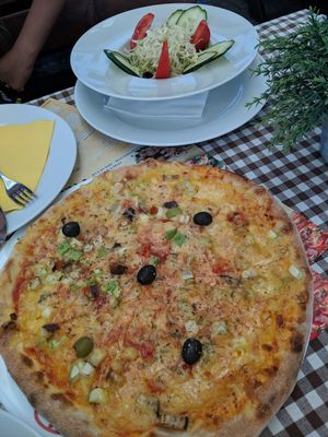 5 euro for 6 slices of cucumber, 3 of tomate and a bit of cabage...dissapointing..pizza had bits of vegetables.. at Dekaderon in Kotor