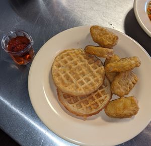 Chick... waffles at Polymath Educational Cafe in Marshfield