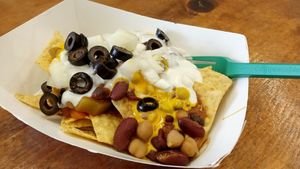 Loaded nachos with chili at Polymath Educational Cafe in Marshfield