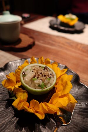 Sunflower blossoms, white corn, qinuo, crab mushroom, sweet pea pods  at Qian Yue Ming in Chongqing