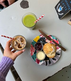 Green smoothie, iced latte, vegan cream tea   at East Village Cafe in Bristol
