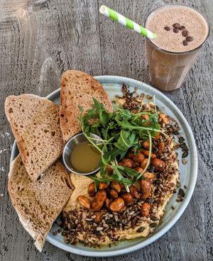 Houmous plate with cacao coffee smoothie at East Village Cafe in Bristol