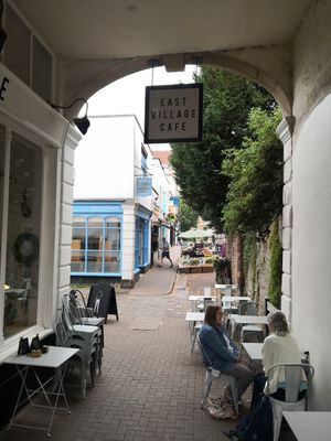 Seating in the archway at East Village Cafe in Bristol