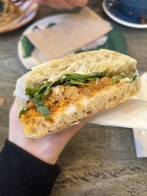 Buffalo Chickpea Toasted Sandwich   at East Village Cafe in Bristol