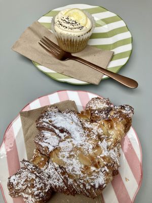 Almond croissant and lemon-poppyseed cupcake   at East Village Cafe in Bristol