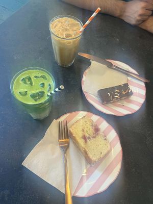 Iced Matcha Latte (left) , Biscoff Latte (top),  Pecan Chcolate Shortbread (right) & Lemon Raspberry Drizzle (bottom)  at East Village Cafe in Bristol