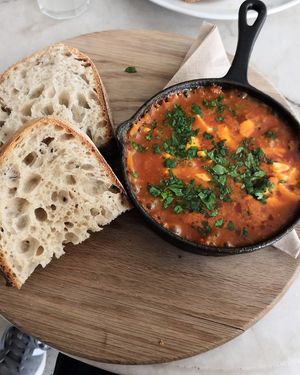 Lovely vegan dish with tofu and sourdough at East Village Cafe in Bristol