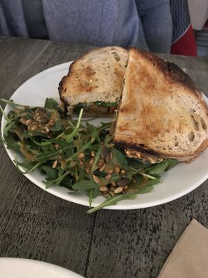 Seitan sausage sandwich  at East Village Cafe in Bristol