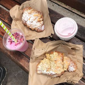 Almond croissants and pink pitaya lattes at East Village Cafe in Bristol