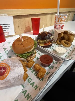 double smash patty fire burger with ghost sauce and a pub cheeze burger sub for a black bean patty with tots and onion rings  at Next Level Burger - Concord in Concord