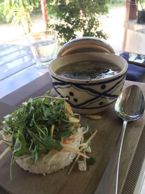 Eggplant dish with a side salad on top of garlic fried rice at Mai Jo Restaurant in Phu Quoc