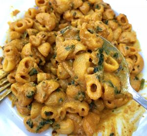 Vegan Mac & Cheese. Sticky gooey chewy yummy. There's a slight yellowish tinge which probably comes from turmeric spice. Bits of chopped spinach and sweet bacon which is actually coconut. at Soul ALife in Central Singapore