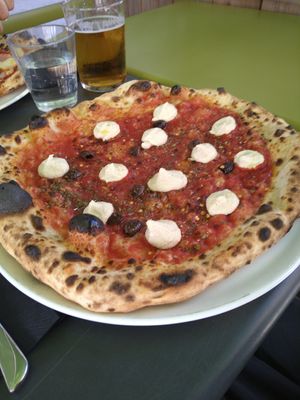 Plain Jane pizza with vegan cheese (cashew ricotta) + added olives as extra topping👍🏻 at Daddy Greens Pizzabar - Humalistonkatu in Helsinki