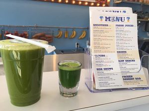 Green Lemonade and Wheatgrass shot! at Wild Blue in Grand Haven