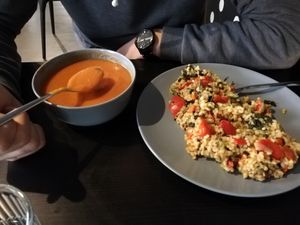 Tomato soup and vegan main dish at Spinati un Sviests in Riga