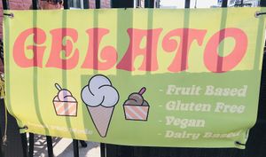 Outdoor sign showing vegan option available  at The Bean Counter Cafe in Picton