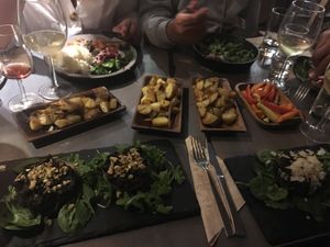 Stuffed portobello mushrooms, roasted potatoes with rosemary & sea salt, seasoned mixed veggies at Bubbles and Bites in Cascais