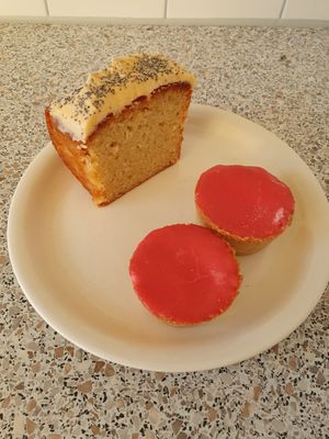 My take-away vegan pastry: one huge slice of cake and 2 roze koeken at Bairro Alto in Nijmegen