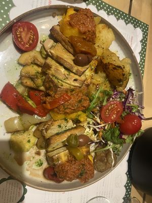 Tofu, potatoes and veggies, polenta, red sauce   at Klopa in Sarajevo