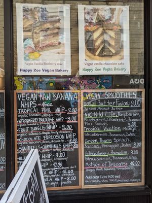 Menus outside at Happy Zoe Vegan Bakery in Brooklyn