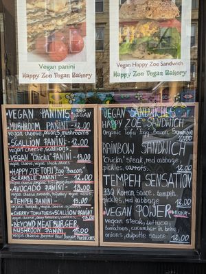 Menus outside at Happy Zoe Vegan Bakery in Brooklyn