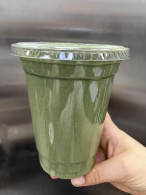 Green spirulina pineapple coconut milk smoothie   at Happy Zoe Vegan Bakery in Brooklyn